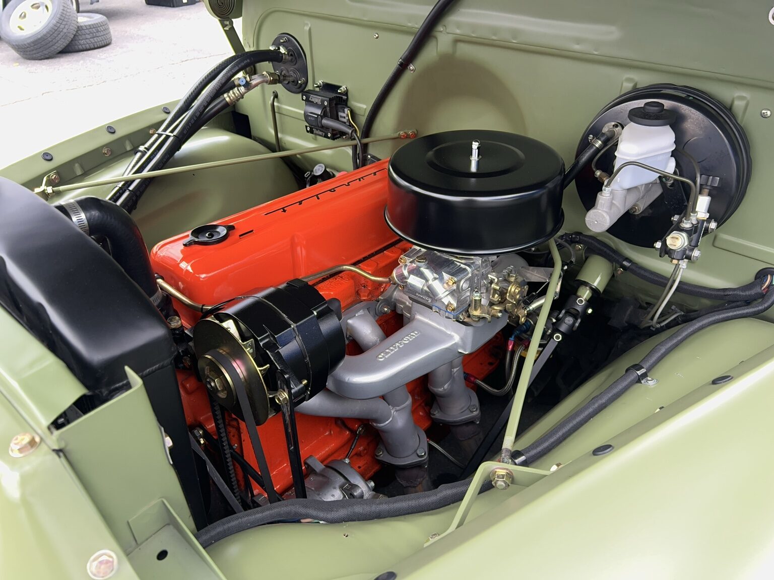 Clean Chevrolet inline-six engine bay at C10 Nationals
