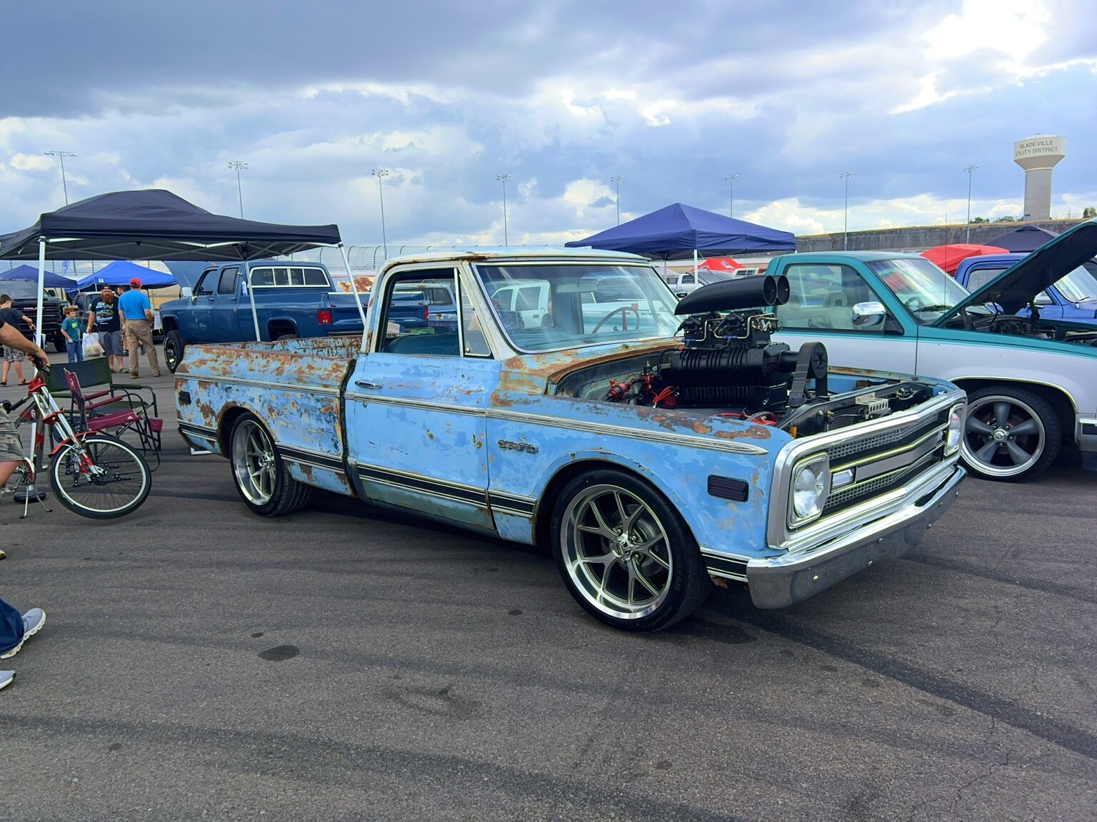 Turquoise patina Chevrolet C10 with a supercharged engine