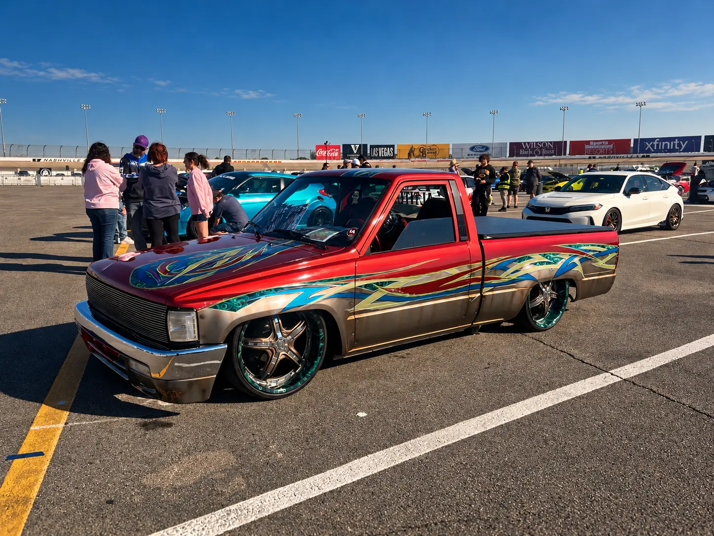 Custom minitruck with detailed multicolor paint at ImportAlliance Nashville Fall 2026