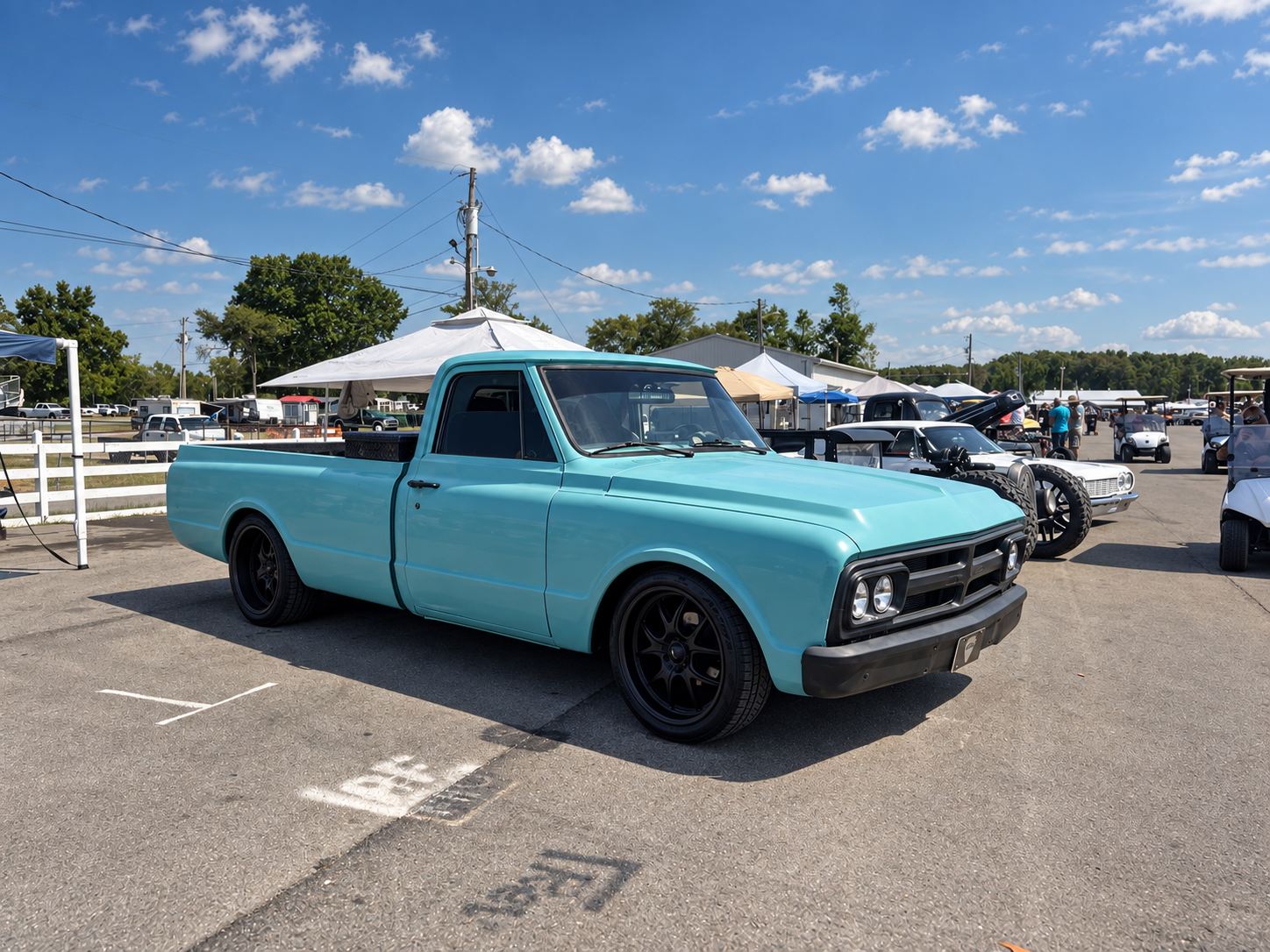 Turquoise classic GMC C10 at the Fall Redneck Rumble 2026